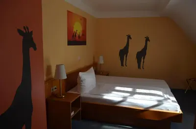 Ein Bett oder Betten in einem Zimmer der Unterkunft Hotel Zum Goldenen Mann