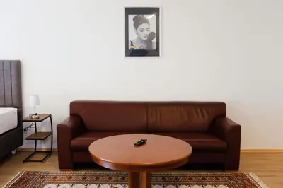 Ein Sitzbereich in der Unterkunft Milchhof Apartments Aschaffenburg