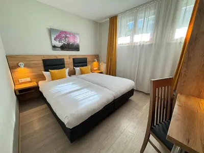 Ein Bett oder Betten in einem Zimmer der Unterkunft Hotel Gute Hoffnung Pforzheim