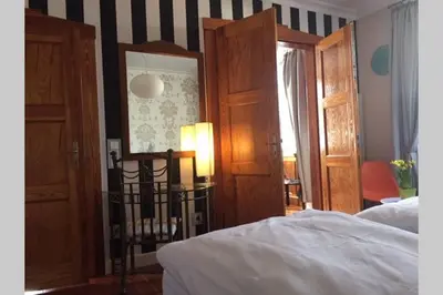 Ein Bett oder Betten in einem Zimmer der Unterkunft Wohlfühlen im rheinhessischen Backsteinhaus
