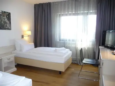 Ein Bett oder Betten in einem Zimmer der Unterkunft Hotel Restaurant Felderbock