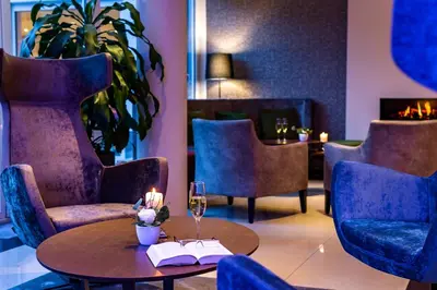 Ein Sitzbereich in der Unterkunft Wellness- und Gartenhotel Heusser