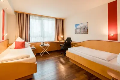 Ein Bett oder Betten in einem Zimmer der Unterkunft L'Escala