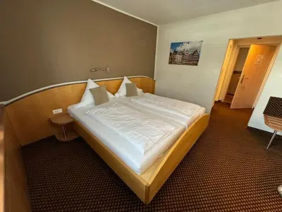 Ein Bett oder Betten in einem Zimmer der Unterkunft L'Escala