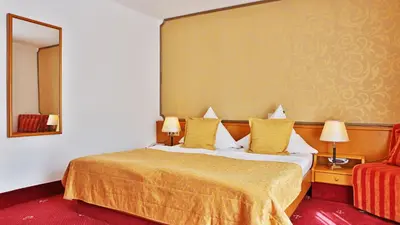 Ein Bett oder Betten in einem Zimmer der Unterkunft Hotel Neckarlux