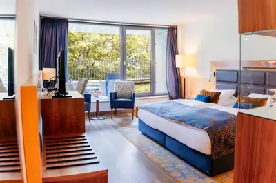 Ein Bett oder Betten in einem Zimmer der Unterkunft FAVORITE Parkhotel I Spa - Business - Fine Dining