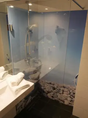 Ein Badezimmer in der Unterkunft Rheinhessen Inn GmbH