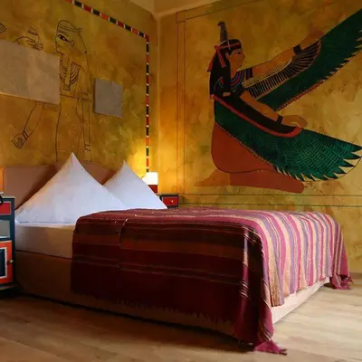 Ein Bett oder Betten in einem Zimmer der Unterkunft HIP Hotel