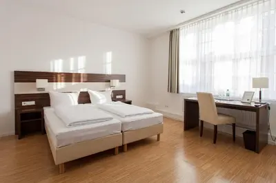 Ein Bett oder Betten in einem Zimmer der Unterkunft Halber Mond