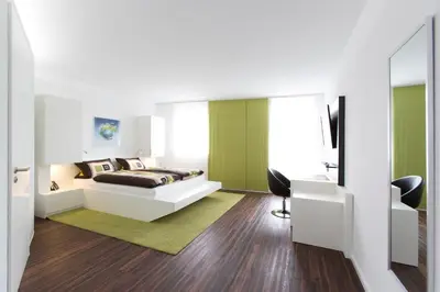 Ein Bett oder Betten in einem Zimmer der Unterkunft Hotel Barth