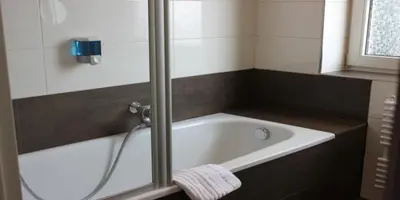 Ein Badezimmer in der Unterkunft Hotel Barth