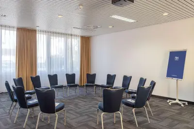 Der Geschäftsbereich oder Konferenzraum in der Unterkunft NH Weinheim