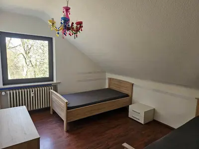 Ein Bett oder Betten in einem Zimmer der Unterkunft Monteurwohnung - Business Apartment