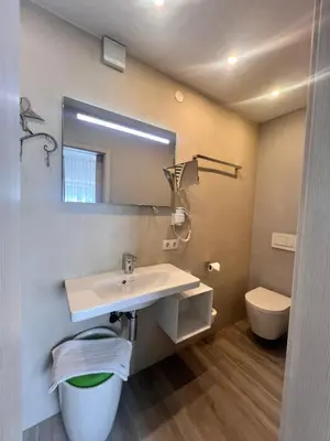 Ein Badezimmer in der Unterkunft Hotel Kriemhilde