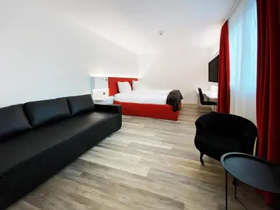 Ein Sitzbereich in der Unterkunft DORMERO Hotel Darmstadt