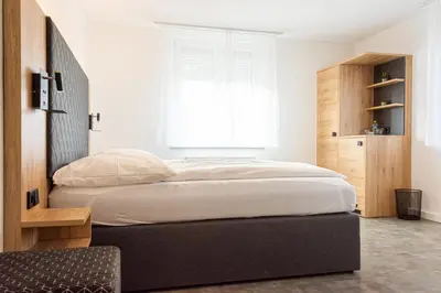 Ein Bett oder Betten in einem Zimmer der Unterkunft Cocco-Bello Smart Check-in Hotel