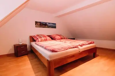 Ein Bett oder Betten in einem Zimmer der Unterkunft Ferienwohnung Casa del Vino