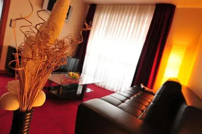 Ein Sitzbereich in der Unterkunft Hotel Santo