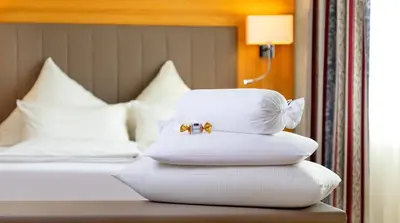 Ein Bett oder Betten in einem Zimmer der Unterkunft Hotel Löwengarten