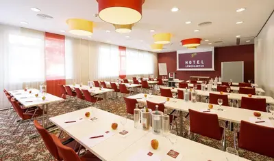 Ein Restaurant oder anderes Speiselokal in der Unterkunft Hotel Löwengarten