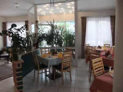 Ein Restaurant oder anderes Speiselokal in der Unterkunft Hotel Garni Classico