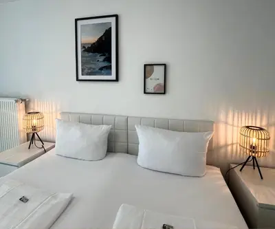 Ein Bett oder Betten in einem Zimmer der Unterkunft PANORAMA HOTEL in Neustadt an der Weinstraße
