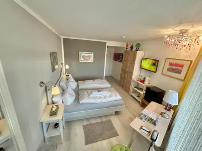 Ein Bett oder Betten in einem Zimmer der Unterkunft Haus am Kurpark