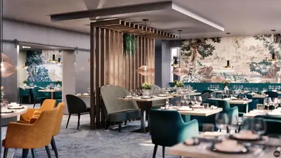 Ein Sitzbereich in der Unterkunft Dom Hotel