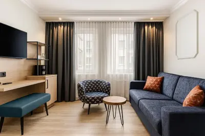 Ein Sitzbereich in der Unterkunft Dom Hotel