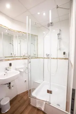 Ein Badezimmer in der Unterkunft Hotel Astoria