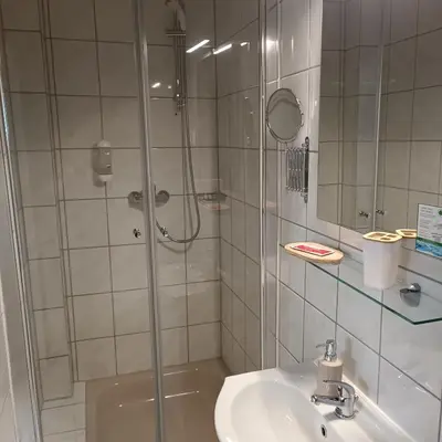 Ein Badezimmer in der Unterkunft Hotel Hasselberg