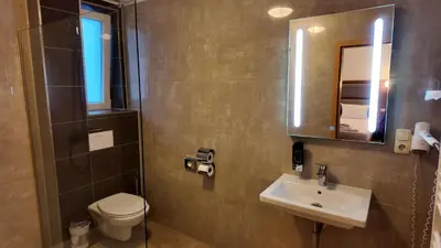 Ein Badezimmer in der Unterkunft Airport Global Hotel