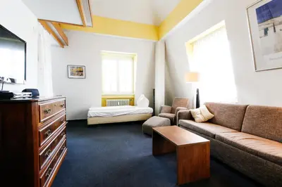 Ein Bett oder Betten in einem Zimmer der Unterkunft Hotel am Tiergarten