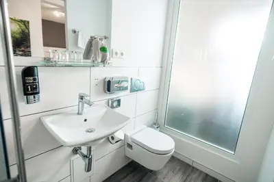 Ein Badezimmer in der Unterkunft Hotel Scharfes Eck