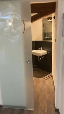 Ein Badezimmer in der Unterkunft BürgerhausLöwen