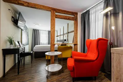 Ein Sitzbereich in der Unterkunft Flair Hotel Hopfengarten