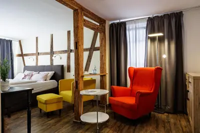 Ein Bett oder Betten in einem Zimmer der Unterkunft Flair Hotel Hopfengarten