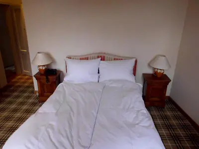 Ein Bett oder Betten in einem Zimmer der Unterkunft Hotel Freihof
