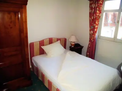 Ein Bett oder Betten in einem Zimmer der Unterkunft Hotel Freihof