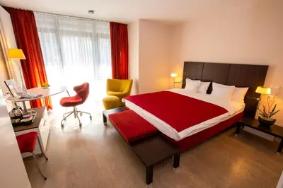 Ein Bett oder Betten in einem Zimmer der Unterkunft Maurers Zollamt Hotel