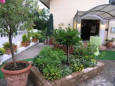 Ein Garten an der Unterkunft Christian Gartenhotel