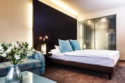 Ein Bett oder Betten in einem Zimmer der Unterkunft Hotel Der Blaue Reiter Design- & Tagungshotel