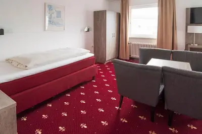 Ein Bett oder Betten in einem Zimmer der Unterkunft Hotel Maurer