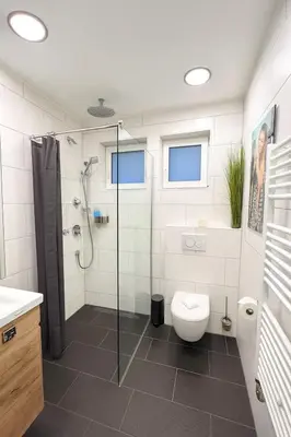 Ein Badezimmer in der Unterkunft Porschenahe Wohung