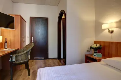 Ein Bett oder Betten in einem Zimmer der Unterkunft Trip Inn Hotel Blankenburg