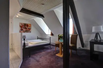 Ein Bett oder Betten in einem Zimmer der Unterkunft Trip Inn Hotel Blankenburg