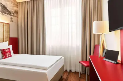 Ein Bett oder Betten in einem Zimmer der Unterkunft Amedia Plaza Speyer, Trademark Collection by Wyndham