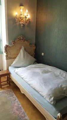 Ein Bett oder Betten in einem Zimmer der Unterkunft Schloss Sennfeld - Hotel & Restaurant & Veranstaltungsort