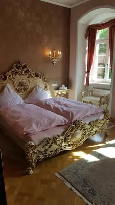 Ein Bett oder Betten in einem Zimmer der Unterkunft Schloss Sennfeld - Hotel & Restaurant & Veranstaltungsort