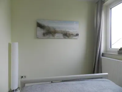 Ein Bett oder Betten in einem Zimmer der Unterkunft Ferienwohnung Burgenblilck
